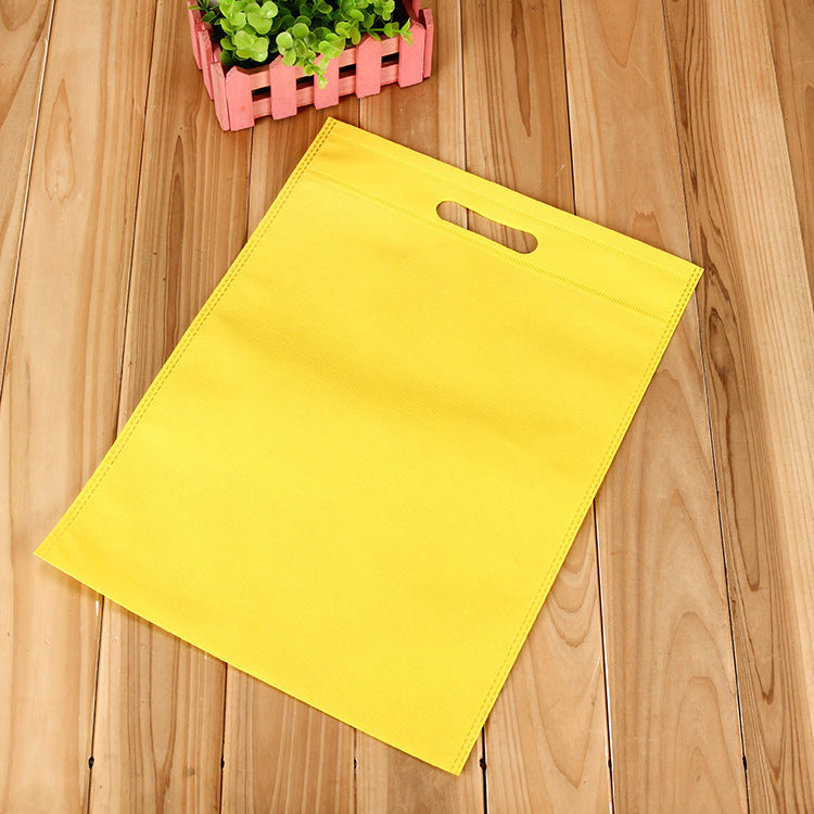Pack of 25 Yellow Coloured 50x40cm Non-Woven Patch Handle Bags
