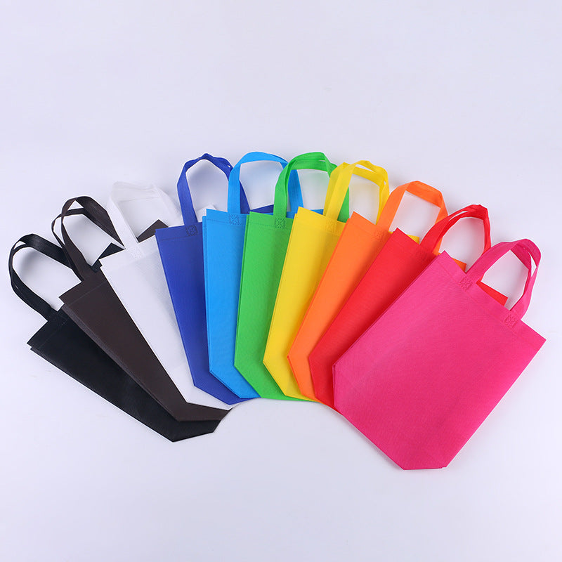 Pack of 100 Ivory Coloured 25x35x10cm Non-Woven Bags with Handle