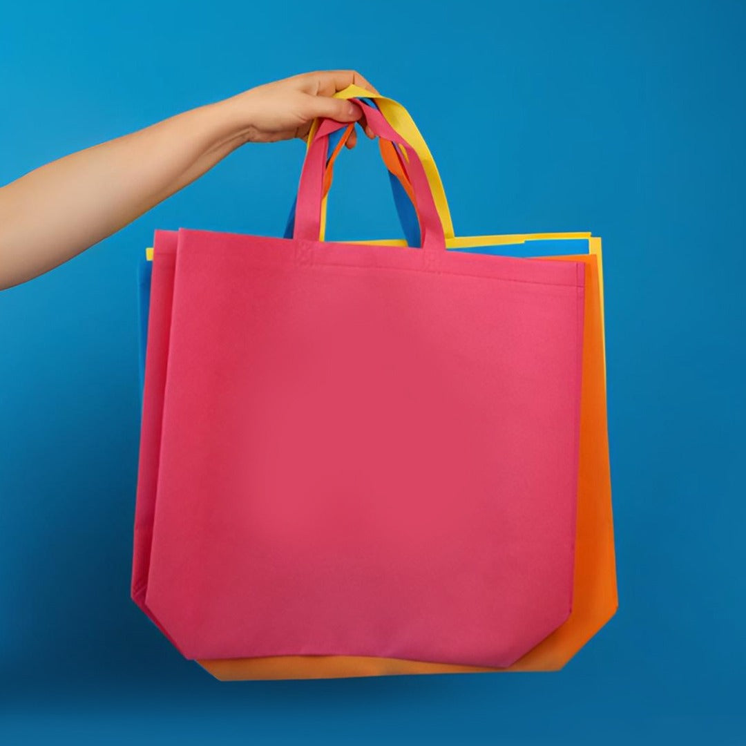 Pack of 100 Pink Coloured 45x35x12cm Non-Woven Bags with Handle